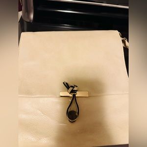Beautiful evening/causal bag. White with unique features. See photo.